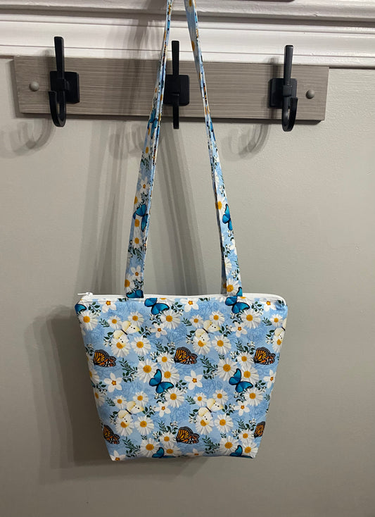 Light blue with daisy floral purse