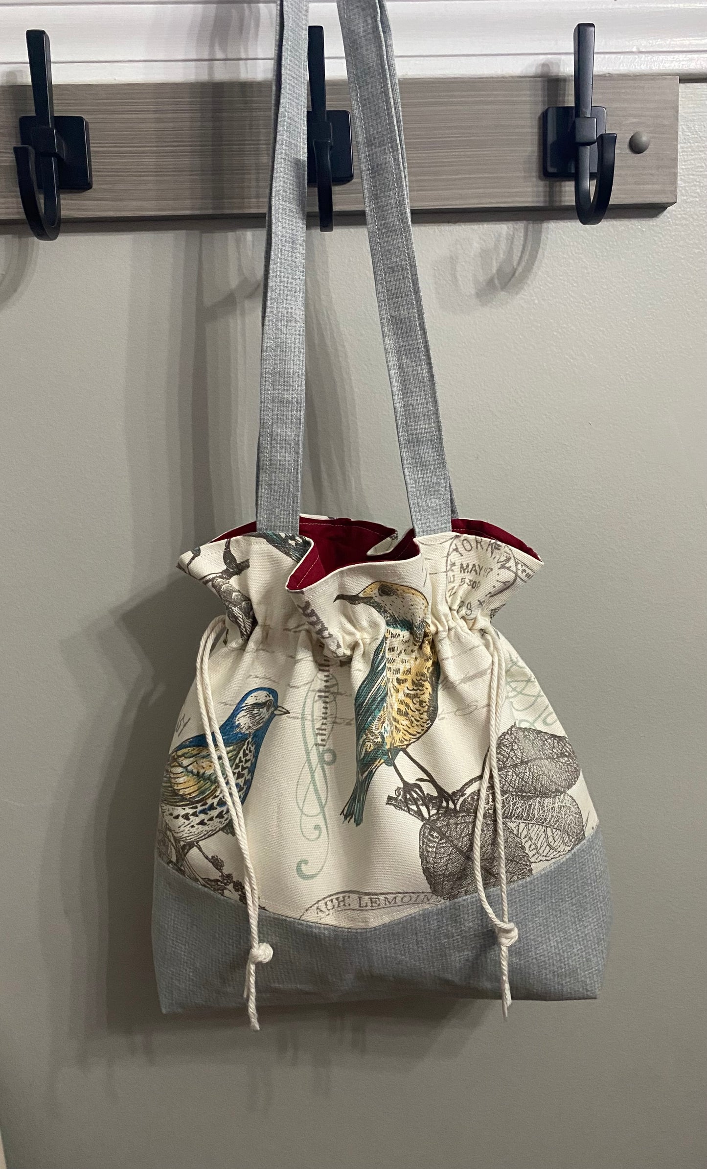 Grey with birds purse and drawstring closure