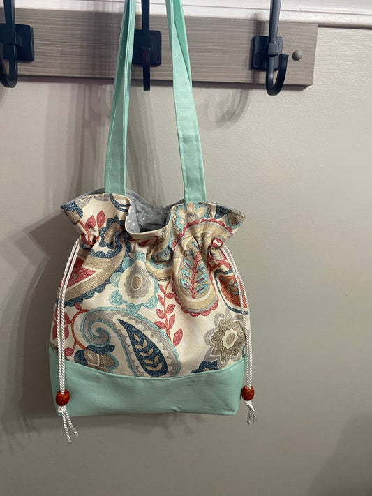 Teal paisley purse with drawstring closure