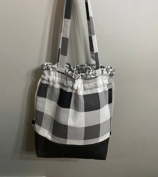 Dark grey/white checker print drawstring purse