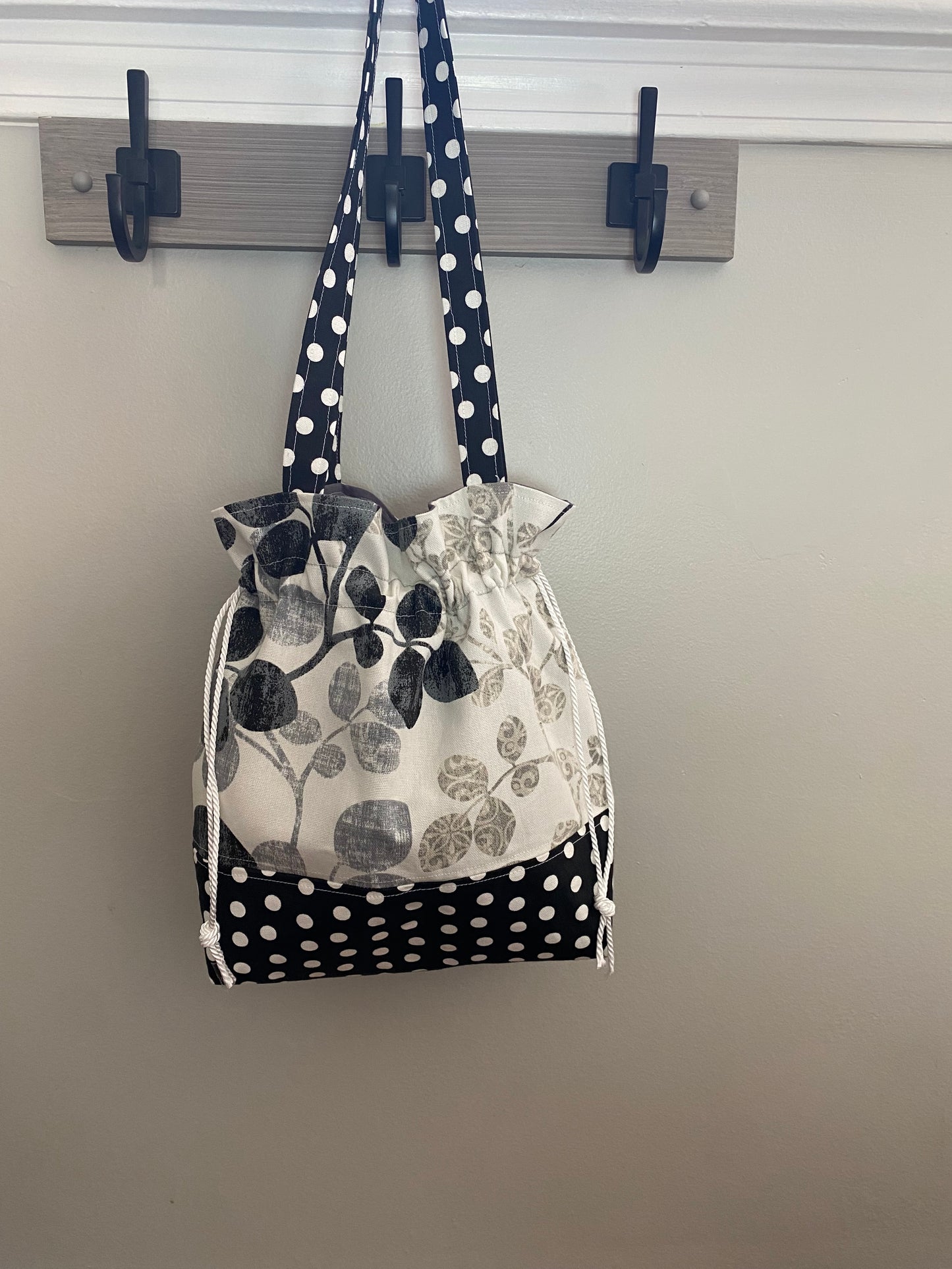 Neutral floral purse with drawstring closure