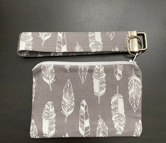 Handmade Grey fabric with white feathers wallet with keychain.