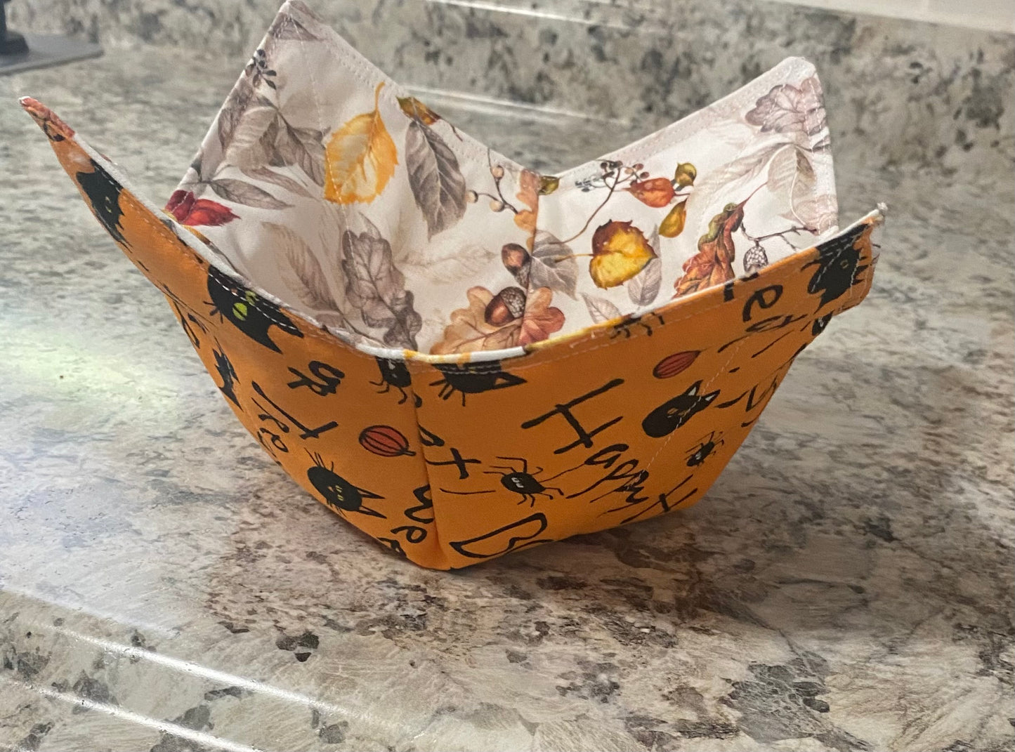 Reversible bowl cozy with Halloween on one side & fall leaves on other