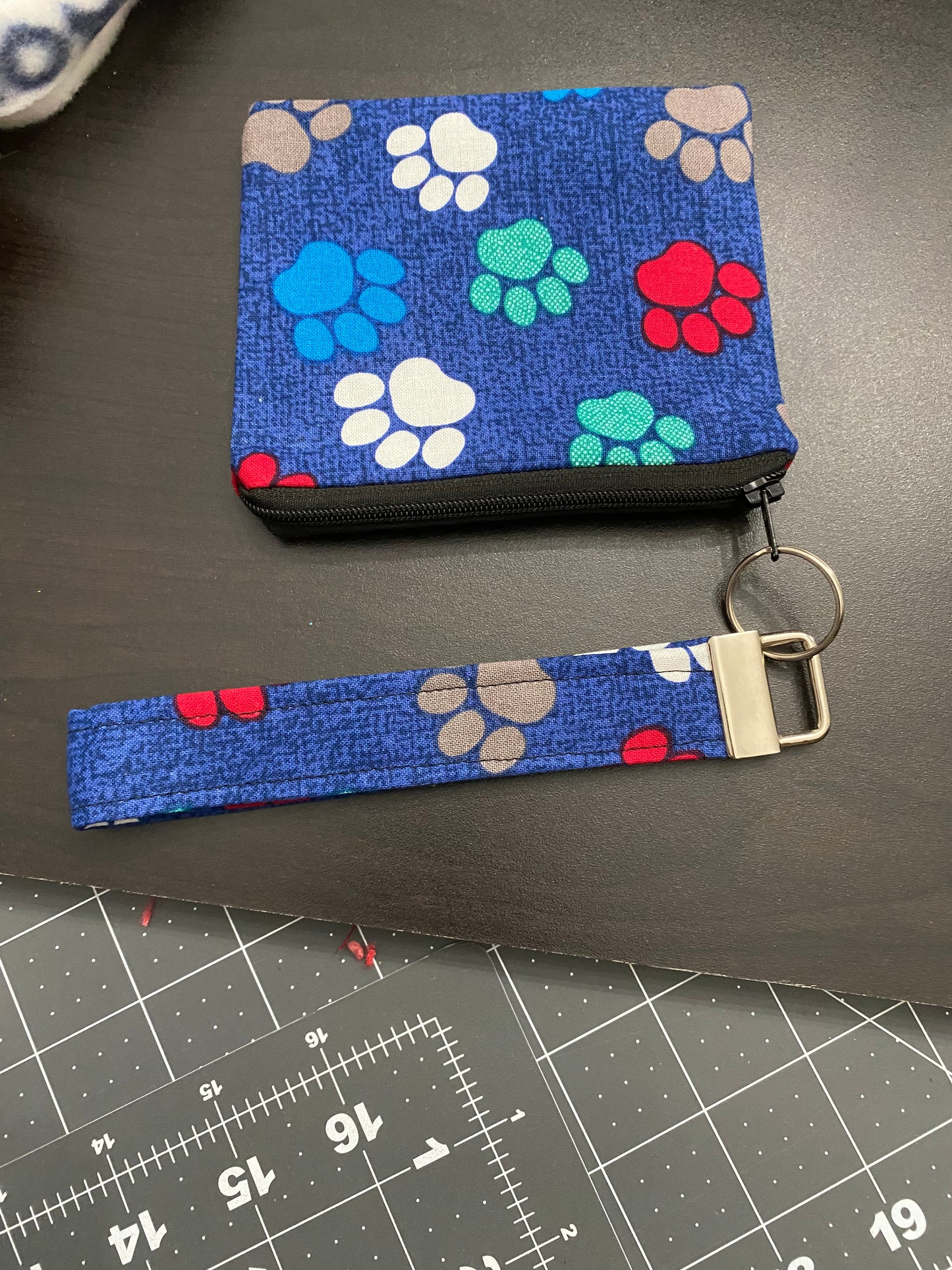 Handmade Blue fabric with multi color paw prints wallet/keychain