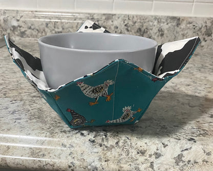 Reversible bowl cozy chicken/cow print